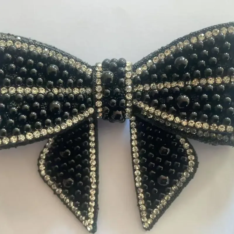 MOÑO PERLA NEGRO